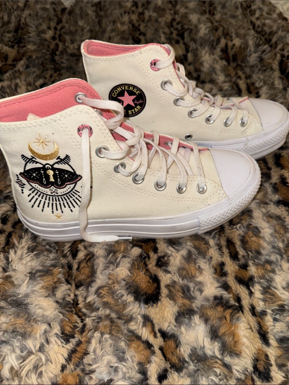Converse Women’sCream High-Top Sneakers with Pink Trim & Embroidered Moon Design